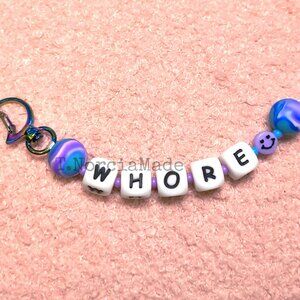 WH0RE: Silicone Offensive Keychain: Teal & Purple Swirl